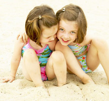 image of kids in sand